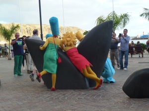 The Simpsons posing on the Whale sculpture near where we were eating!